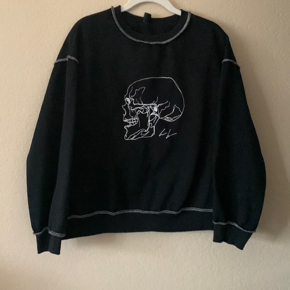 Black sweater with a skull. Size Small from SHEIN